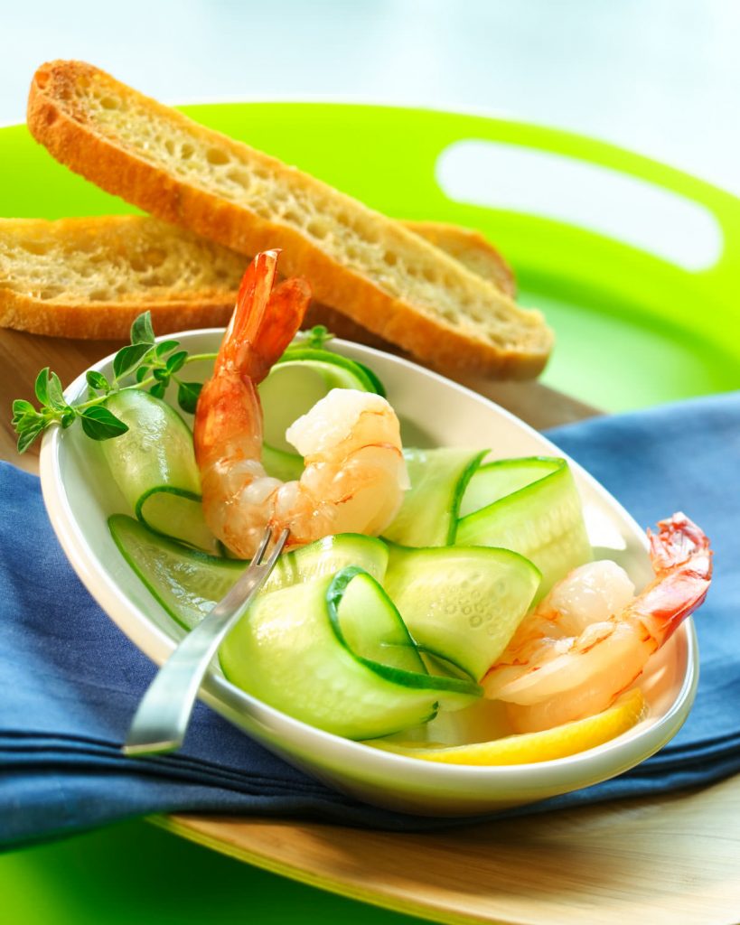 shrimp cocktail appetizer with cucumber and bread, food photography by Jeff Cords